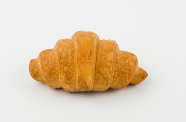 Delicious croissants with cherry jam on a white background