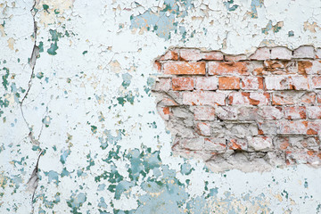 very old dilapidated brick wall