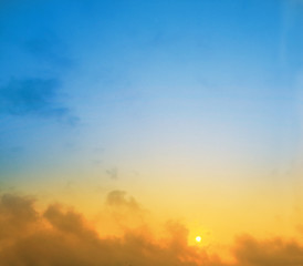 Fototapeta premium Beautiful Sunrise yellow and blue sky background with copy space