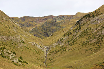 Escape to the Pyrenees from dawn to dusk Set of panoramic images of the Pyrenees from the sunrise to the sunset, where we can appreciate: meadows, mountains, rivers, villages, houses. © JosepIgnasi