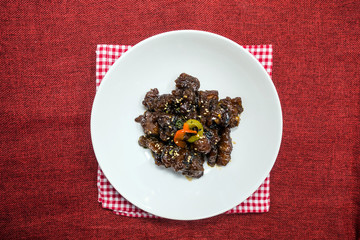wok fried chicken stir fry with sweet peppers and chinese vegetables
