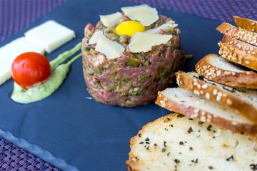 tasty Steak tartare (Raw beef) - classic steak tartare on white plate