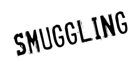 Smuggling rubber stamp. Grunge design with dust scratches. Effects can be easily removed for a clean, crisp look. Color is easily changed.