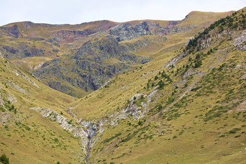 Escape to the Pyrenees from dawn to dusk Set of panoramic images of the Pyrenees from the sunrise to the sunset, where we can appreciate: meadows, mountains, rivers, villages, houses. © JosepIgnasi