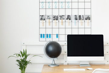 Globe and desktop on desk