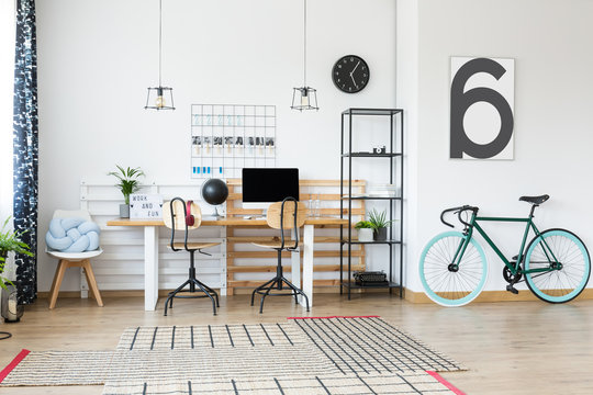 Black bike in home office