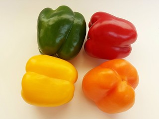 Colorful bell pepper on white background, closeup