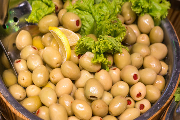 Delicious green olives in the market. Olives from Turkey