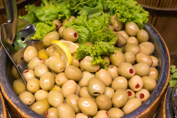 Delicious green olives in the market. Olives from Turkey