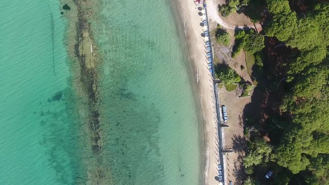 Overhead view of Torre Mozza Beach and Tower, going down.