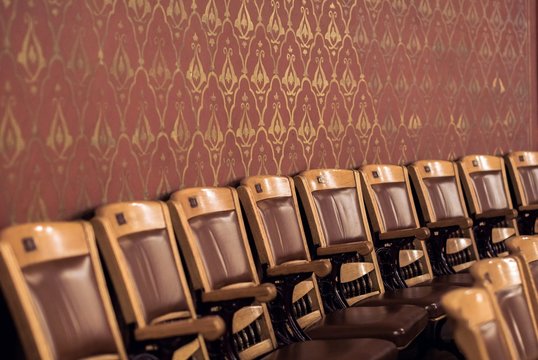 Row of vintage chairs at theater