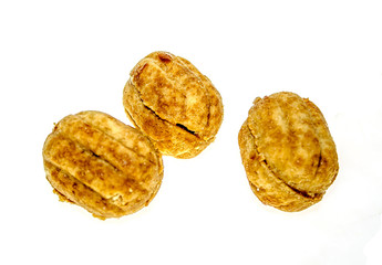 Nutlet cookies with condensed milk on white background