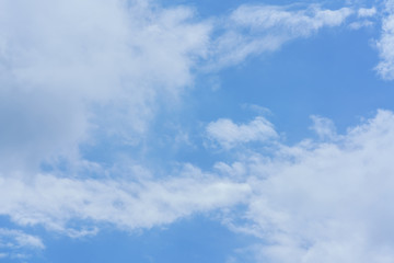 Beautiful white clouds and blue sky background