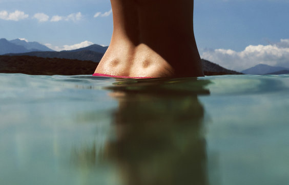 back with dimples of venus in the sea closeup