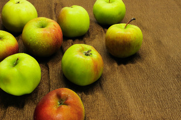 scattered green apples