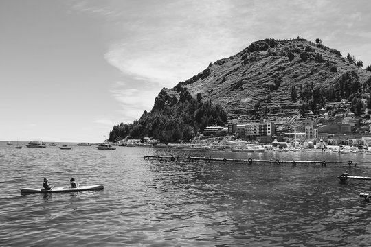 boat sailing through the lake in la paz, bolivia