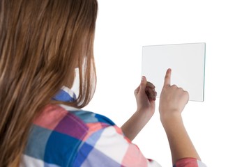 Girl using a glass digital tablet against white background