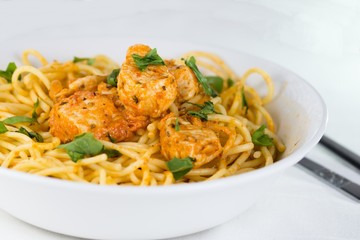 Spaghetti with chicken meat and cream sauce