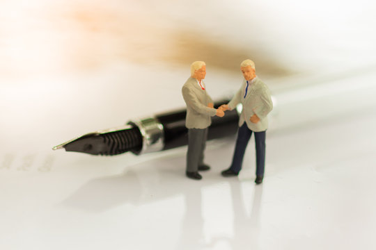 Two men make a deal, Business partner meeting concept.