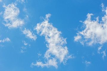  White shreds of clouds in the blue sky