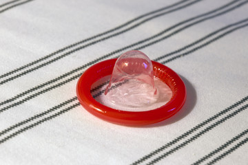Condom on bed