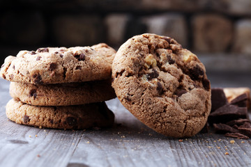 Chocolate cookies on wooden table. Chocolate chip cookies shot.