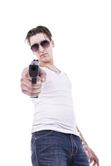 Fototapeta na wymiar Bad guy pointing handgun, isolated on white background.