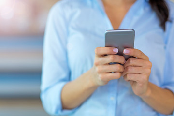 Businesswoman using smartphone 
