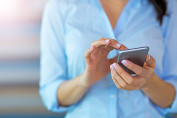 Businesswoman using smartphone 
