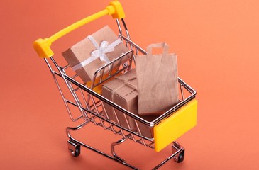 colorful gifts box,supermarket shopping cart