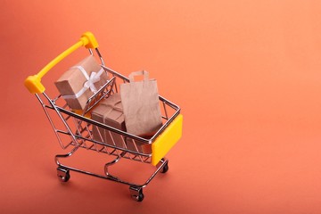 colorful gifts box,supermarket shopping cart