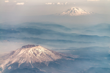 Fototapeta na wymiar St Helens Volcano and Mount Adams from airplane