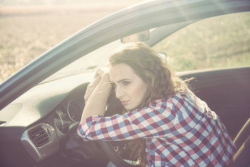 Stressing woman in car