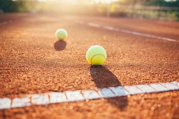 Fotobehang Tennis ball on tennis court © yossarian6