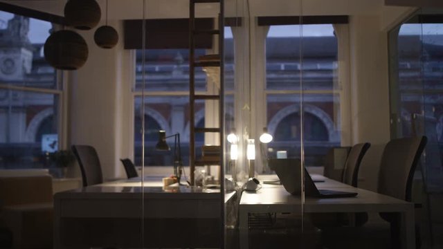  Interior of empty city office at dusk. No people. 