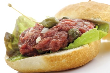 Tartare with capers and diced onion on bread