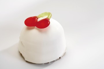 Marshmallow treat topped with cherry jujube, winegum