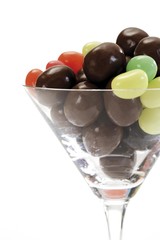 Coloured Easter eggs in a cocktail glass