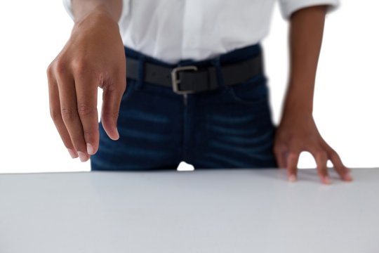 Teenage Boy Pretending To Work On An Invisible Object