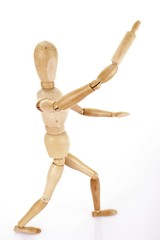 Wooden jointed figure with a rolling pin