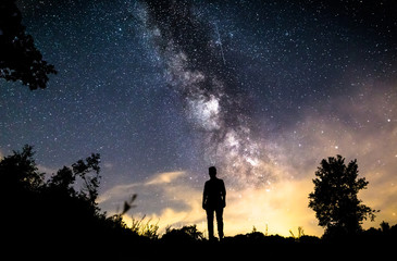 Fototapeta na wymiar Man standing deep sky in germany