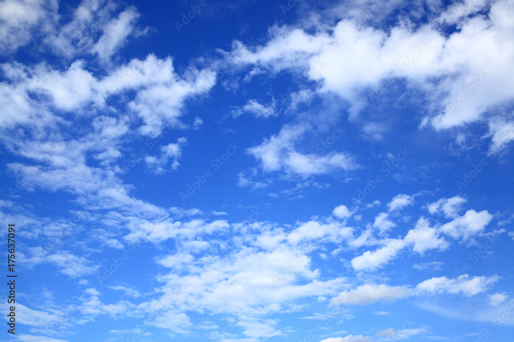 Wall mural dark blue sky with clouds