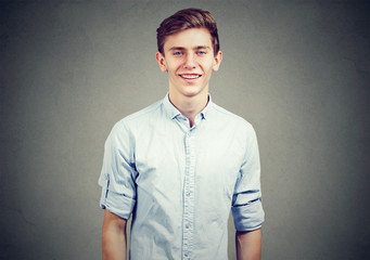 Portrait of a happy teenager man smiling