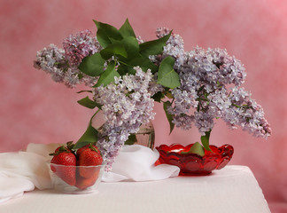 Strawberries and lilacs still life