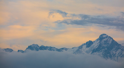 clouds in the mountains at sunset