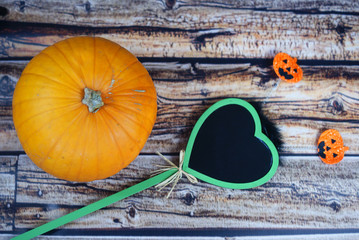 Halloween - pumpkin and blackboard.