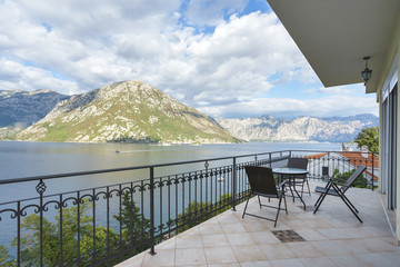 Terrace of a luxury villa with a mountain and sea view