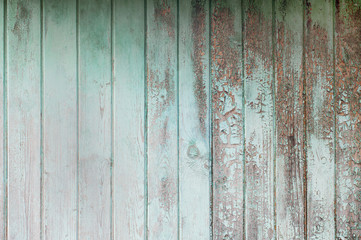Fototapeta na wymiar Turquoise worn wooden surface