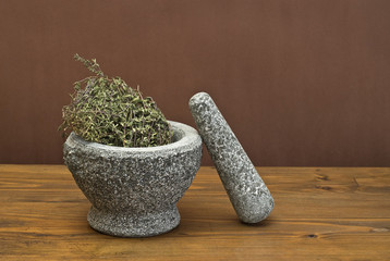 Thyme (Thymus vulgaris), dried in granite mortar