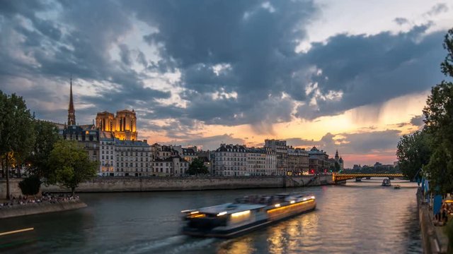 People and boats day to night timelapse, Le Pont D'Arcole bridge after sunset, Paris, France, Europe